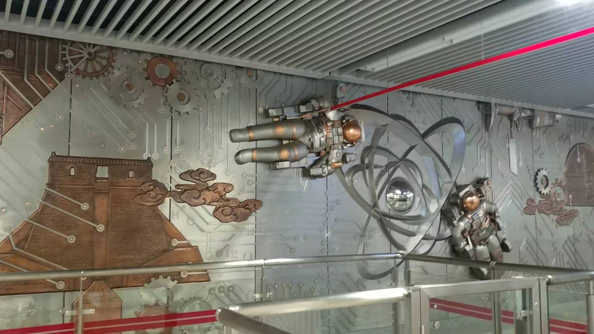 一些现代科技题材的浮雕壁画都会用不锈钢来表现,突出画面的质感,同样